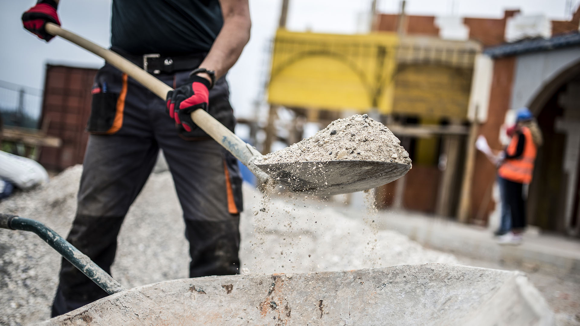 shoveling concrete 
