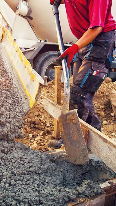 shoveling concrete 