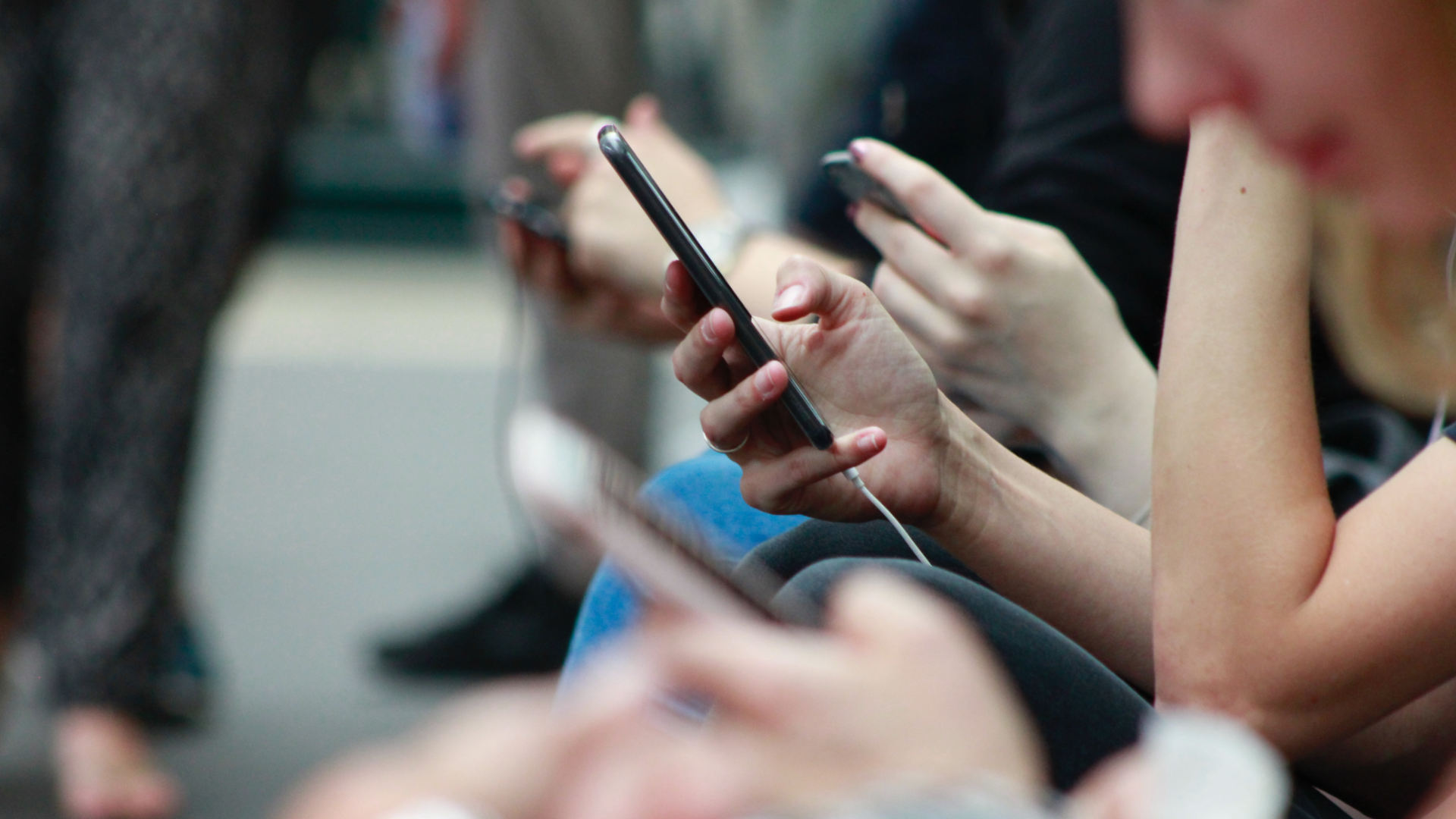 people using their mobile phones 