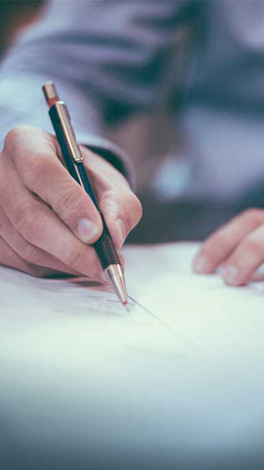 man completing paperwork 