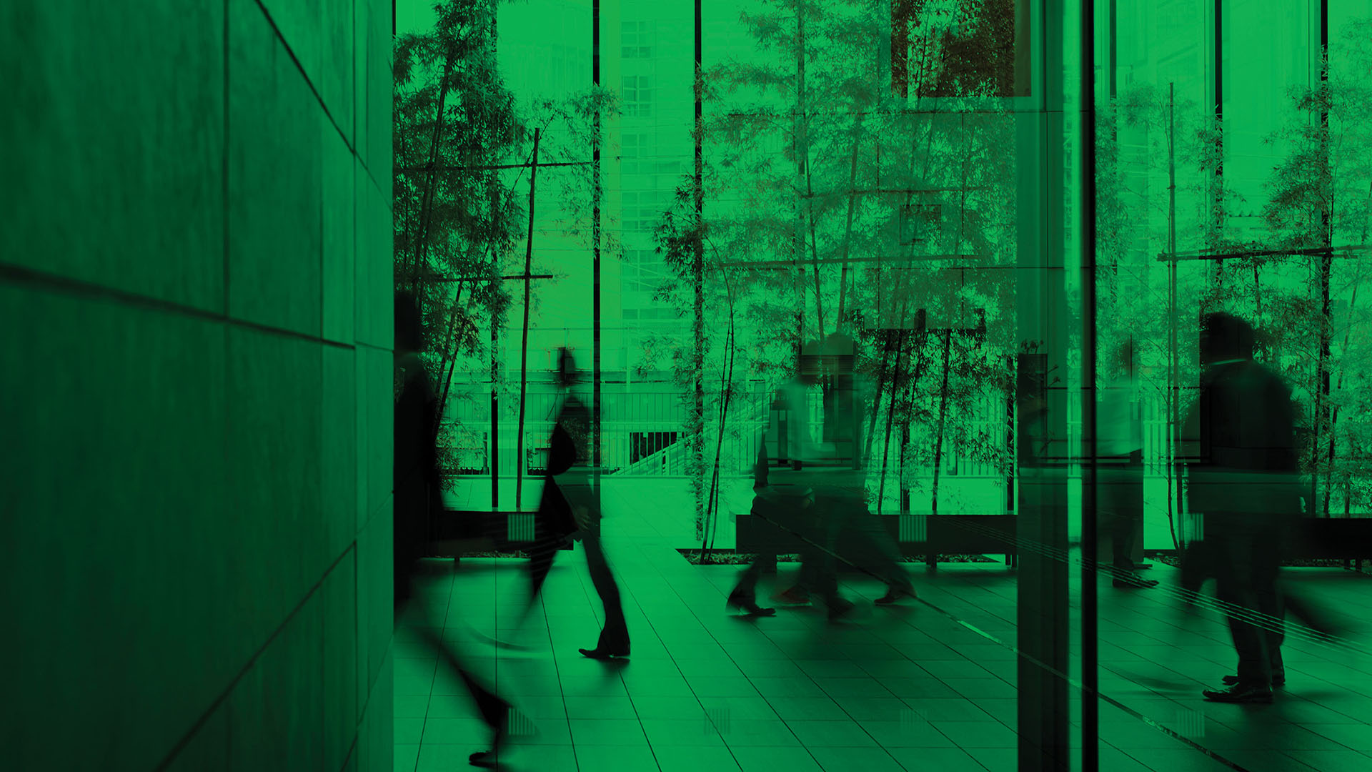 people walking through office